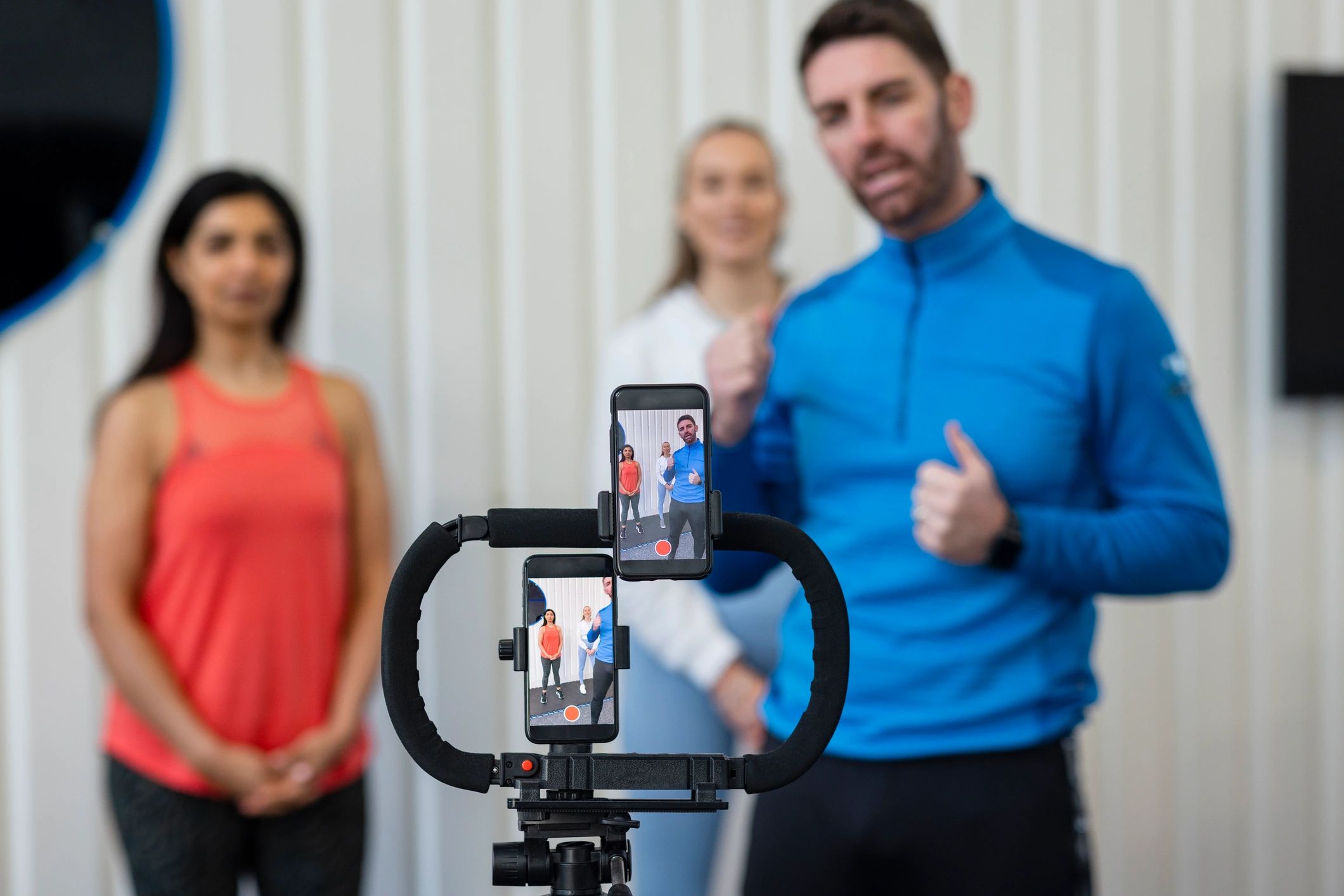 Personal trainer live streaming a fitness class